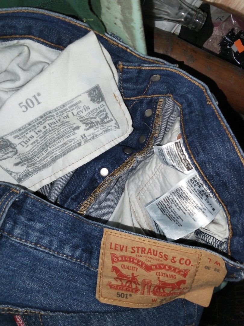 Levi's 501 Jeans (Category: Jeans) located in Zamboanga. Submitted by nurjimdigo71795 (Listing ID 1429929045, Image 3). Description: Classic Levi's 501 jeans in a dark wash. Features the iconic red Levi's tag and button fly. The jeans have a straight leg fit and classic five-pocket styling. The size tag is visible in the images. A timeless piece for any wardrobe..
