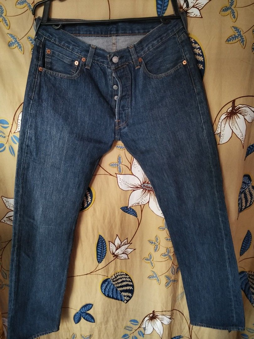 Levi's 501 Jeans (Category: Jeans) located in Zamboanga. Submitted by nurjimdigo71795 (Listing ID 1429929045, Image 2). Description: Classic Levi's 501 jeans in a dark wash. Features the iconic red Levi's tag and button fly. The jeans have a straight leg fit and classic five-pocket styling. The size tag is visible in the images. A timeless piece for any wardrobe..
