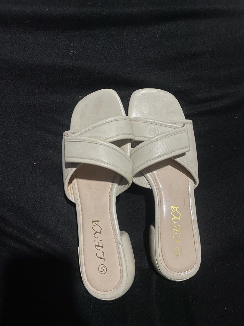 LEYA White Sandals (Category: Flats & Sandals) located in Malabon City. Submitted by chielychu (Listing ID 1429988963, Image 1). Description: ✨ FOR SALE: White Sandals ✨ 💸 Price: ₱150 (190) ✔️ Good condition ✔️ Clean and ready to use ✔️ Comfortable and stylish Reason for selling: Decluttering 📍 Meet-up / Delivery: Malabon 💬 Message me if intereste.