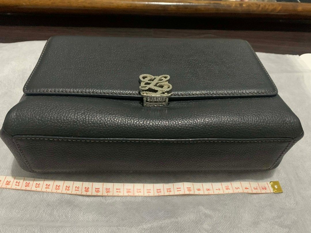 Louis Quatorze Convertible Bag (Category: Luxury Bags & Wallets) located in Marikina City. Submitted by rafmorales (Listing ID 1421575831, Image 2). Description: - Bluish Gray color - Silver hardware - Chain strap - Textured leather - Flap closure - LQ logo detail - Perfect for any occasion.
