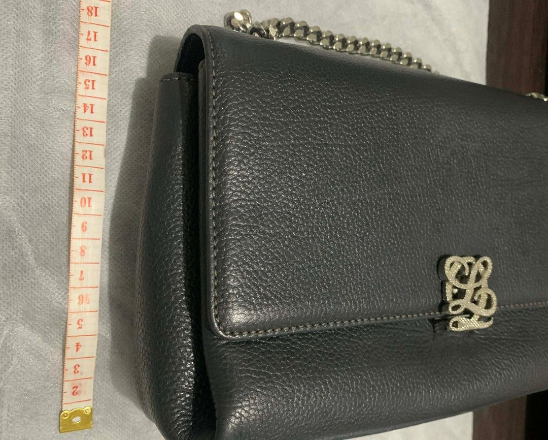 Louis Quatorze Convertible Bag (Category: Luxury Bags & Wallets) located in Marikina City. Submitted by rafmorales (Listing ID 1421575831, Image 3). Description: - Bluish Gray color - Silver hardware - Chain strap - Textured leather - Flap closure - LQ logo detail - Perfect for any occasion.