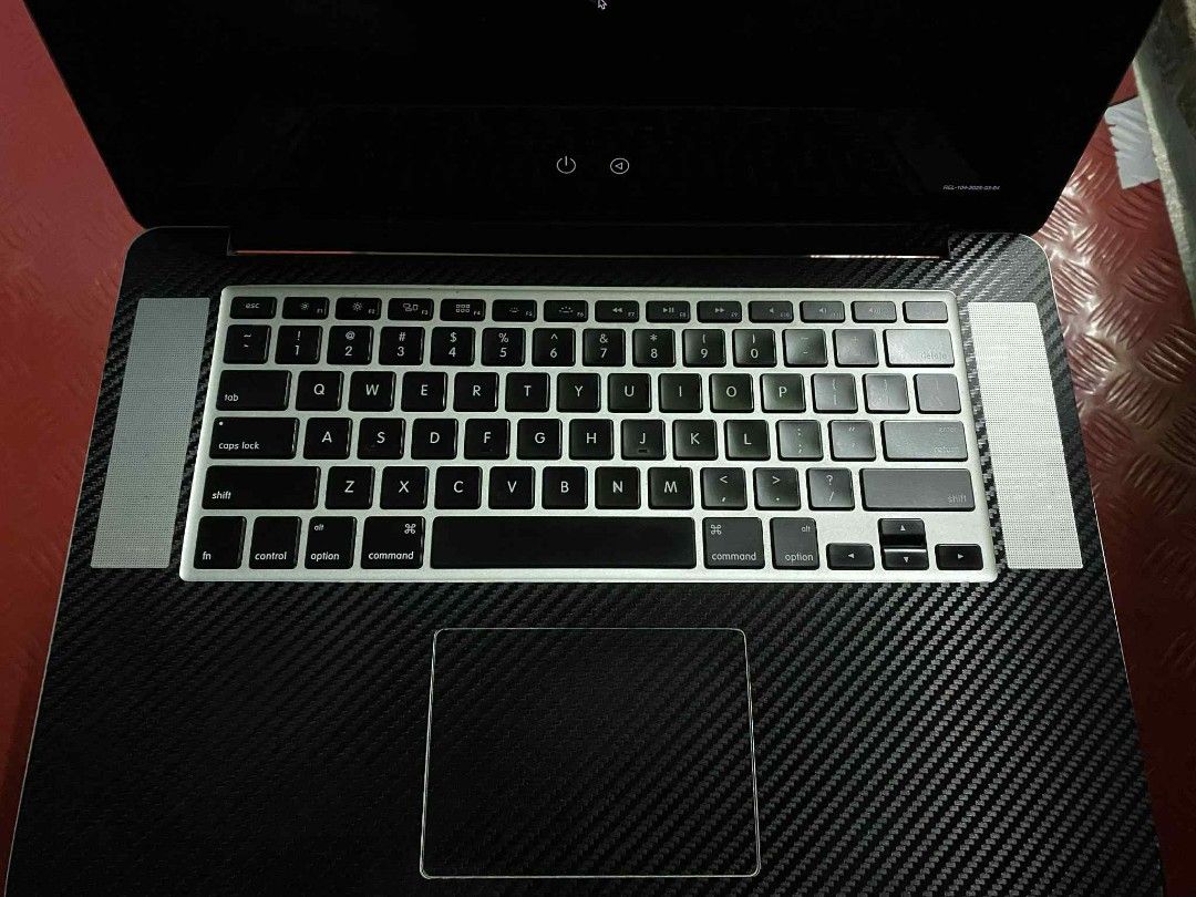 Macbook Pro 15-inch Late 2013 (Category: Laptops & Notebooks) located in Quezon City. Submitted by minimalist.man (Listing ID 1429954004, Image 3). Description: Macbook Pro 15-inch Late 2013 with 65W charger, leather sleeve, and carbon decal installed.