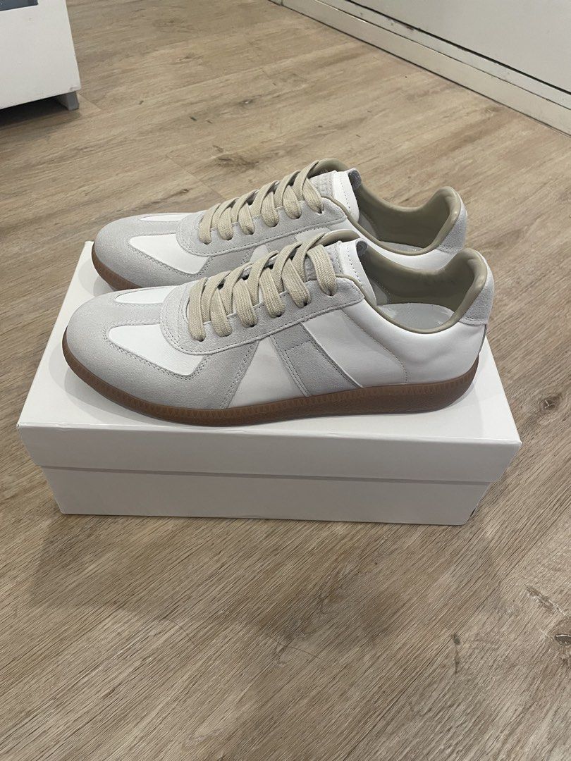 Maison Margiela Gats (Category: Sneakers) located in Quezon City. Submitted by thrift.claim (Listing ID 1429880108, Image 2). Description: 🍷Maison Margiela Gats - Sizes 35-45 Available (US Men's 3-11) (US Women's 5-13) - Brand new, NO ISSUES AT ALL - With box and all shoe fillers and shoe cover 📌UNLI VC UNLI VOUCH, open to meetup for safety of buyer (QC/Marikina only) 📌Shipping via courier of choice All Flaws will be indicated, if any :).