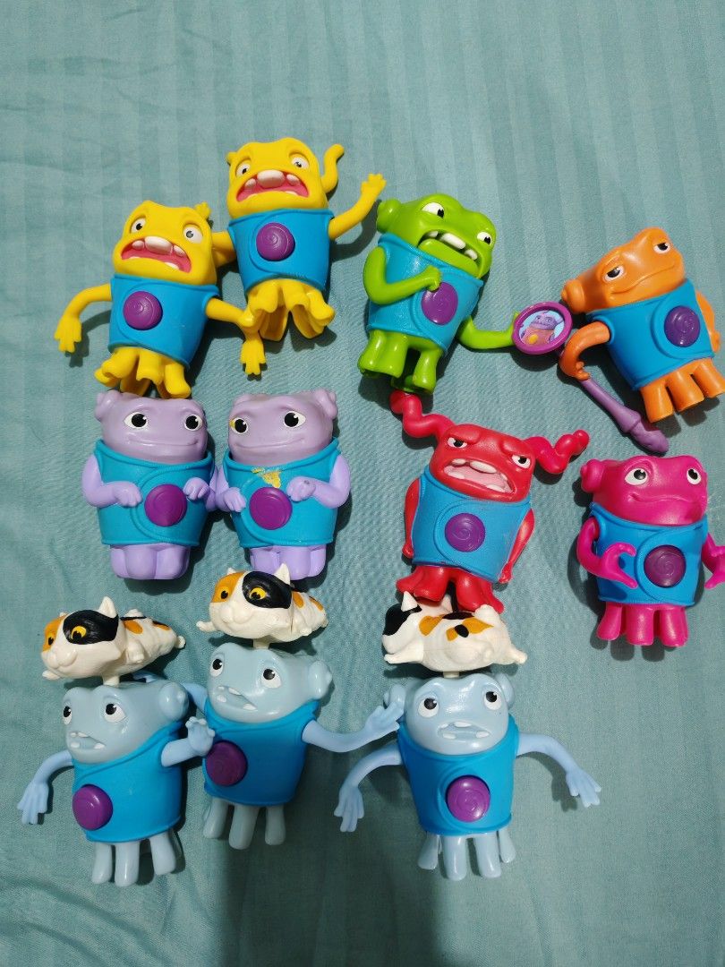 Mcdo happy meal-Home Movie Characters Toy Figures (Category: Toys & Games) located in Quezon City. Submitted by tiffy2010 (Listing ID 1429972212, Image 2). Description: These collectible figures are McDonald's Happy Meal toys from the 2015 promotion for the DreamWorks animated movie Home. Characters: The toys feature characters named Oh and his cat, Pig, in various poses. Set Details: The full collection included multiple figures, some of which f