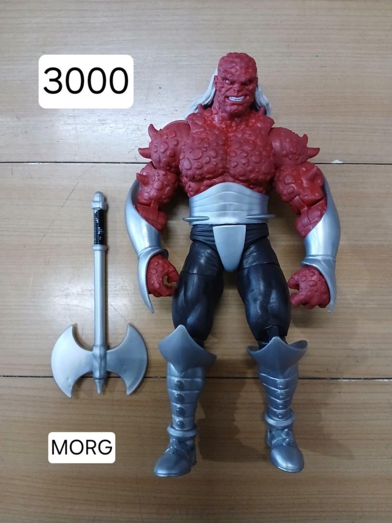 Morg Action Figure with Axe (Category: Figurines & Statues) located in Manila. Submitted by rhenz22 (Listing ID 1429939382, Image 1). Description: Morg action figure features a detailed sculpt and comes with an axe accessory. The figure has a red and gray color scheme. It is a collectible item for fans of the character..