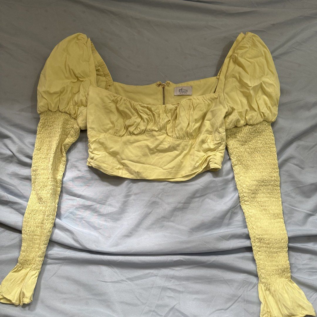 Oh Polly Yellow Crop Top (Category: Sleeveless) located in Aloran. Submitted by kheyx (Listing ID 1429857354, Image 1). Description: can fit small best fit semi med super nice shade of yellow di halata sa pic.
