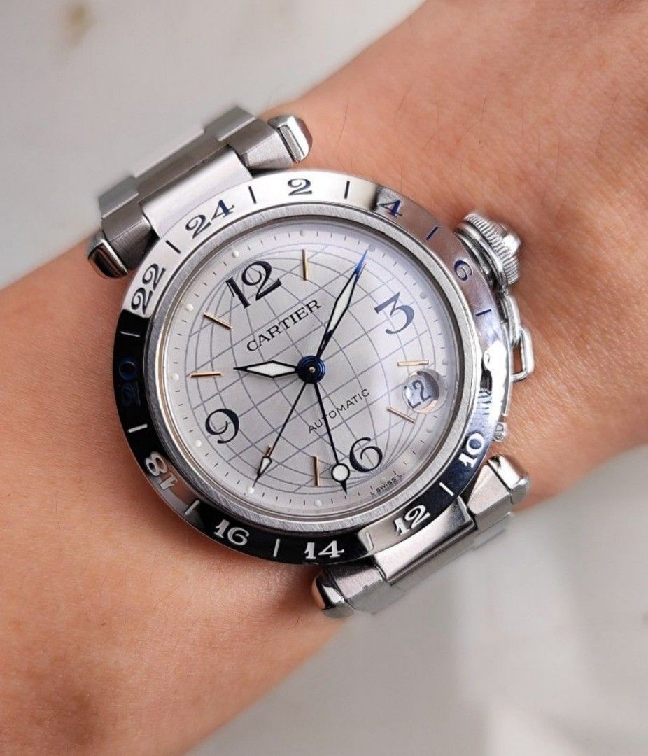 Original Cartier Pasha GMT 35mm (Category: Luxury Watches) located in San Juan City. Submitted by exclusivelyours (Listing ID 1429893357, Image 2). Description: Cartier Pasha GMT 35mm Silver globe dial Automatic Ref 2377 9/10 condition Inclusions: watch, original bracelet fit to approx 6.8" wrist, Cartier AM box and watch case *watch is verified on Cartier Care website - with certificate *photo reference on 6.5" wrist.