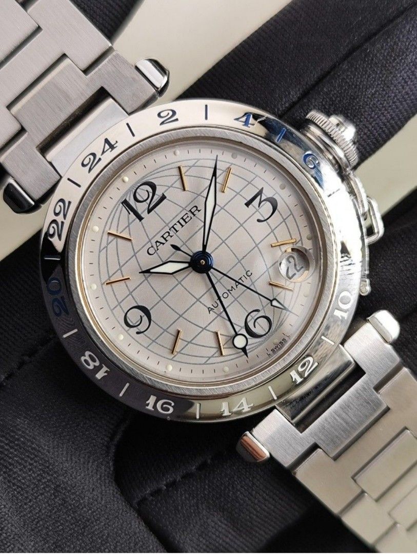 Original Cartier Pasha GMT 35mm (Category: Luxury Watches) located in San Juan City. Submitted by exclusivelyours (Listing ID 1429893357, Image 3). Description: Cartier Pasha GMT 35mm Silver globe dial Automatic Ref 2377 9/10 condition Inclusions: watch, original bracelet fit to approx 6.8" wrist, Cartier AM box and watch case *watch is verified on Cartier Care website - with certificate *photo reference on 6.5" wrist.