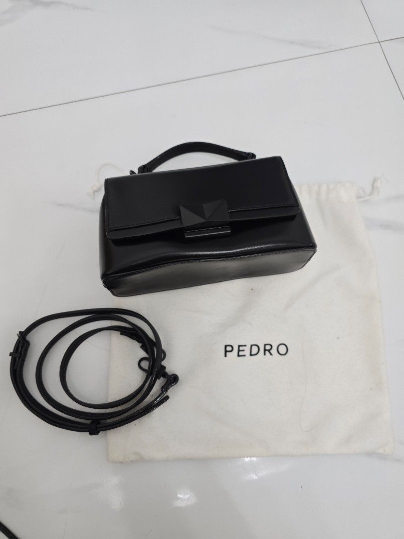 Pedro Black Handbag with Shoulder Strap (Category: Shoulder Bags) located in Las Pinas. Submitted by vanpru (Listing ID 1430007548, Image 1). Description: Pedro mini crossbody bag Almost new barely used .