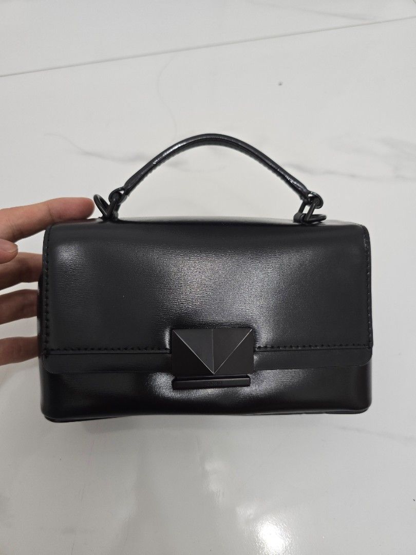 Pedro Black Handbag with Shoulder Strap (Category: Shoulder Bags) located in Las Pinas. Submitted by vanpru (Listing ID 1430007548, Image 2). Description: Pedro mini crossbody bag Almost new barely used .