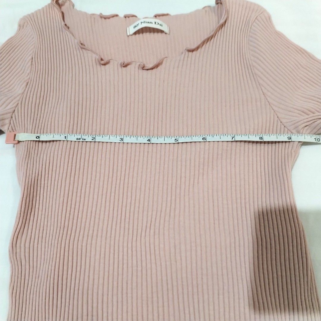Pink ribbed lettuce hem top shirt (Category: Shirts) located in San Fernando. Submitted by decluttrwithella (Listing ID 1429913708, Image 3). Description: Negotiable! Stretchy Size: XS/S, measurements are shown in the photos (inches) Color: Light dusty rose pink🩷 Condition: No flaws!👌 PLS READ👇 - Accepting payments thru Gcash - Shipping thru J&T - No when worn photos unless uploaded - Serious buyers only! No cancellations, refunds, or exchange