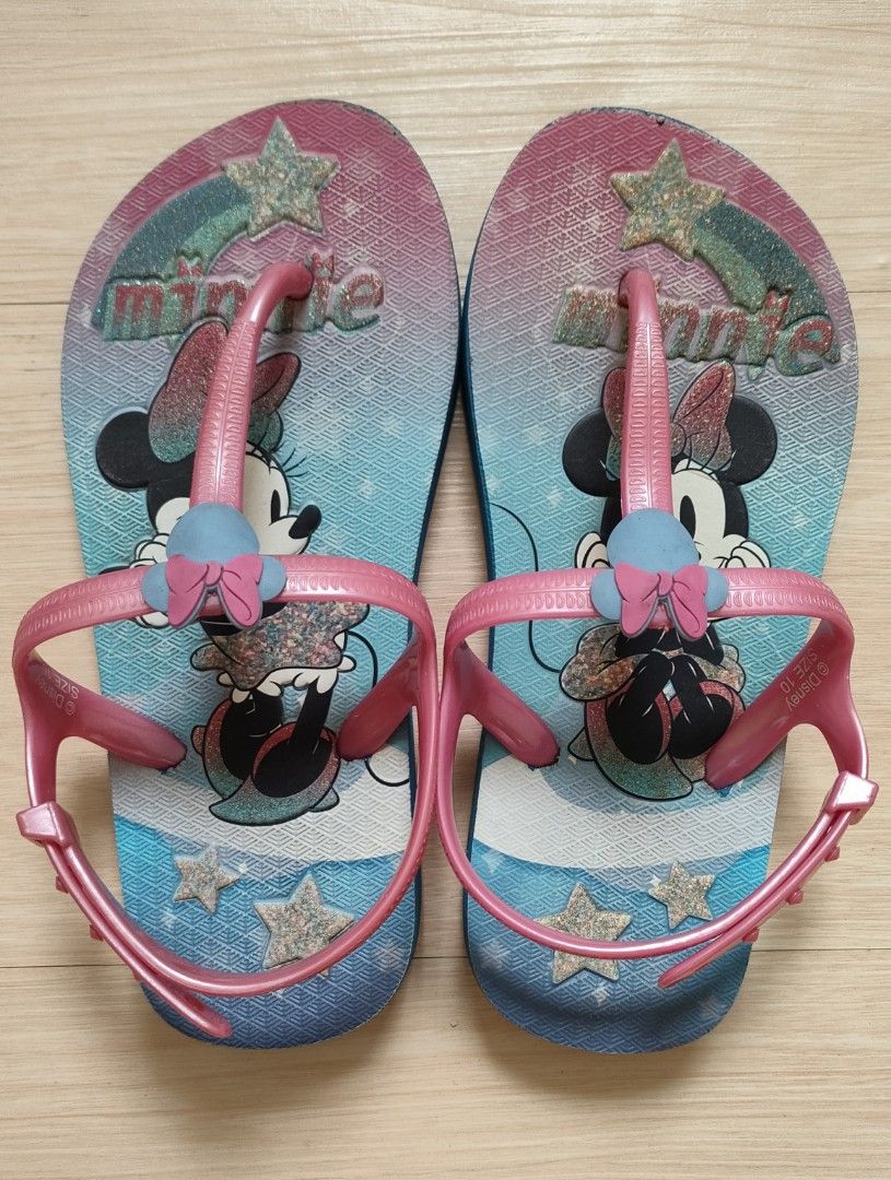 preloved Disney Minnie Mouse Flip-flops Size 10 (Category: Babies & Kids Fashion) located in Mandaluyong City. Submitted by itscris28 (Listing ID 1429929077, Image 1). Description: - Adorable Minnie Mouse flip-flops - Features a pink strap and a colorful design with Minnie Mouse on the footbed - Size 10 - The footbed measures approximately 7 inches in length - Perfect for a Disney fan - The flip-flops have a blue sole - With adjustable strap #pre