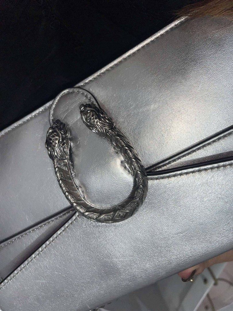 RARE Gucci Dionysus Silver Small Bag | LegitGrails Authenticated (Category: Luxury Bags & Wallets) located in Imus. Submitted by velvetboutique (Listing ID 1429839528, Image 3). Description: Authentic Gucci Dionysus Small shoulder bag in metallic silver leather, finished with the iconic tiger head closure and palladium hardware. A statement piece from the Alessandro Michele era. Authenticated by LegitGrails (digital certificate available). No box