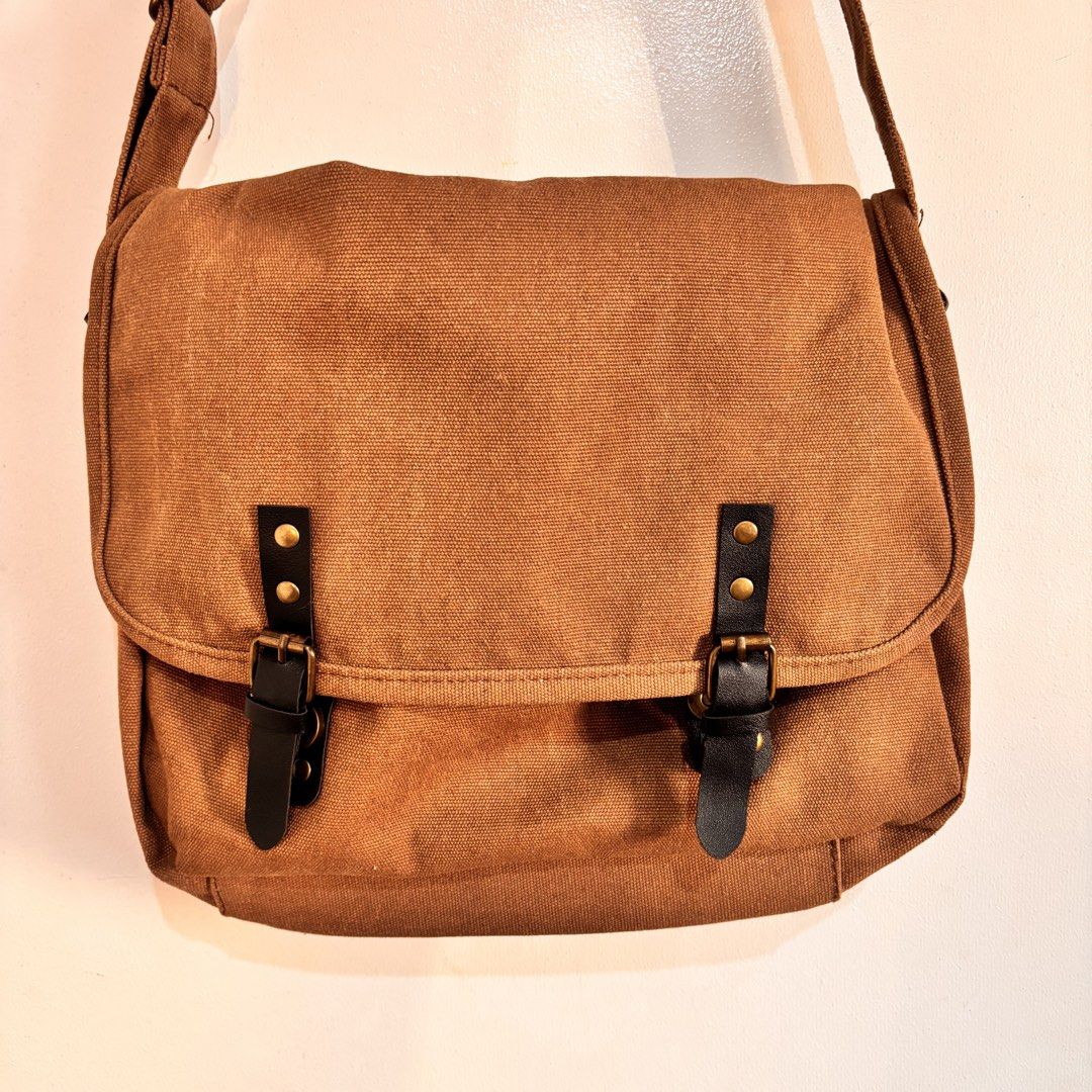 Retro Canvas/Messenger Bag (Category: Cross-body Bags) located in Pasig City. Submitted by homeworkdotcom (Listing ID 1429840163, Image 2). Description: 💌 rfs: decluttering, moving out :) 🧺 brand new, never used. bought impulsively! 💸 MariBank / Maya / GCash 📍 Pasig City 🚚 buyer to shoulder shipping fee: 🌃 metro manila: Lalamove / Grab Express / J&T 🏡 outside metro manila: J&T.