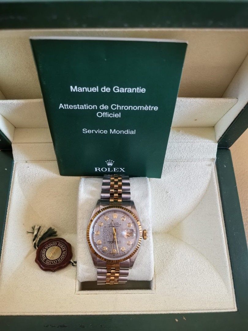 rolex two tone 36mm (Category: Luxury Watches) located in Cabadbaran. Submitted by luxurysourcedbyjinx (Listing ID 1429841668, Image 1). Description: Rush deal Rolex 36mm Upgraded dial with diamond Anniversary edition computer face with diamonds. 1980s to 90s model With box and verification.