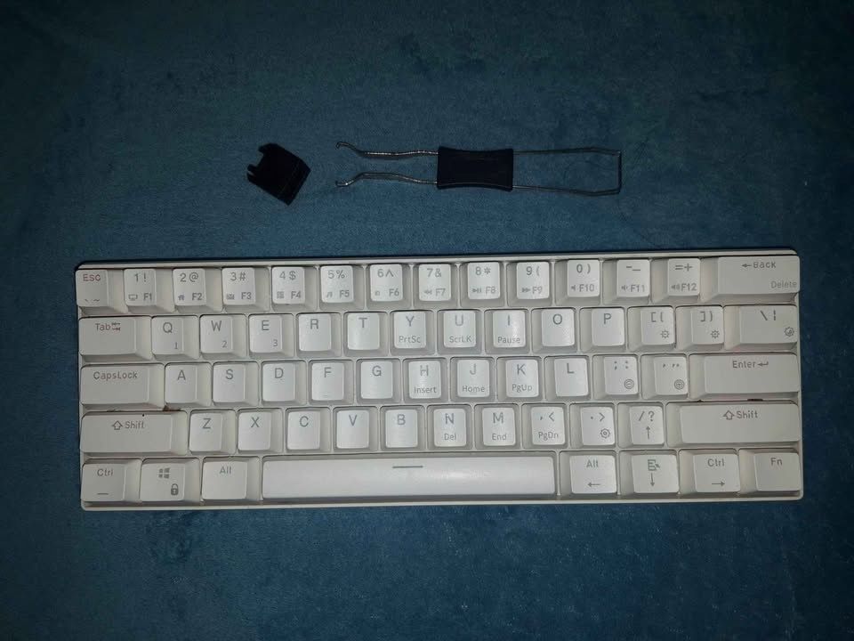 Royal Kludge RK61 - 60% Mechanical Keyboard (Category: Computer Keyboard) located in Marikina City. Submitted by fritoleigh (Listing ID 1429975839, Image 2). Description: White Royal Kludge RK61 - 60% Mechanical Keyboard Hot-swappable. Red switches. Wired and Bluetooth mode. Condition: Smooth, well-maintained, and fully functional. Note: This is for the UNIT ONLY. I lost the cable, but any standard Type-C cable will work. FREE wireless, brandless