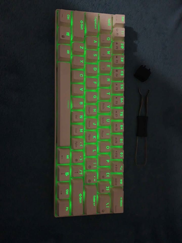 Royal Kludge RK61 - 60% Mechanical Keyboard (Category: Computer Keyboard) located in Marikina City. Submitted by fritoleigh (Listing ID 1429975839, Image 3). Description: White Royal Kludge RK61 - 60% Mechanical Keyboard Hot-swappable. Red switches. Wired and Bluetooth mode. Condition: Smooth, well-maintained, and fully functional. Note: This is for the UNIT ONLY. I lost the cable, but any standard Type-C cable will work. FREE wireless, brandless