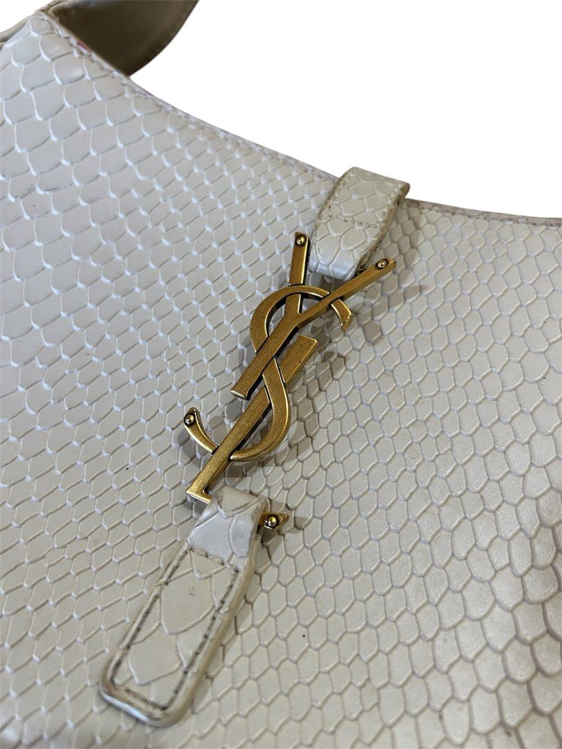 Saint Laurent Le 5à7 Embossed Python Skin Hobo/Kili Bag (Category: Luxury Bags & Wallets) located in Cagayan de Oro. Submitted by oracle_archives (Listing ID 1429853077, Image 2). Description: Saint Laurent Le 5à7 Embossed Python Skin Hobo/Kili Bag Pen stain inside check photo attached, bag rate 8/10 still in good shape. Offer if interested thanks.