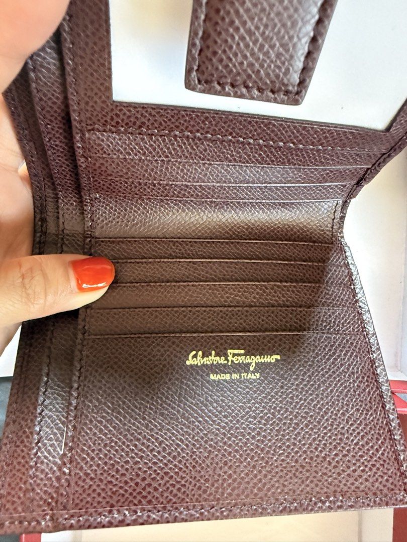 Salvatore Ferragamo Brown Leather Wallet (Category: Luxury Bags & Wallets) located in Makati City. Submitted by ichika_t (Listing ID 1429856230, Image 2). Description: Deep Bordeaux Color Material : Pebble Calf Brand New Folded Wallet Can fit bills , cards, photos, coins .