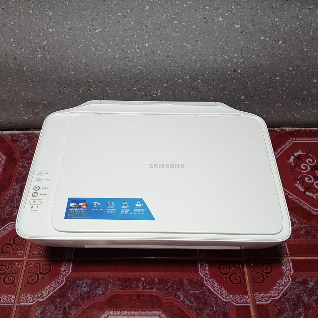 Samsung SL-J1680 Series Printer (Category: Printers, Scanners & Copiers) located in Manila. Submitted by jungscloset (Listing ID 1429872932, Image 2). Description: Samsung SL-J1680 Series printer. Includes the original box, cables, and manuals. The printer is white. The printer is in its original packaging. The model number is SL-J1680. No cartridges, No ink..