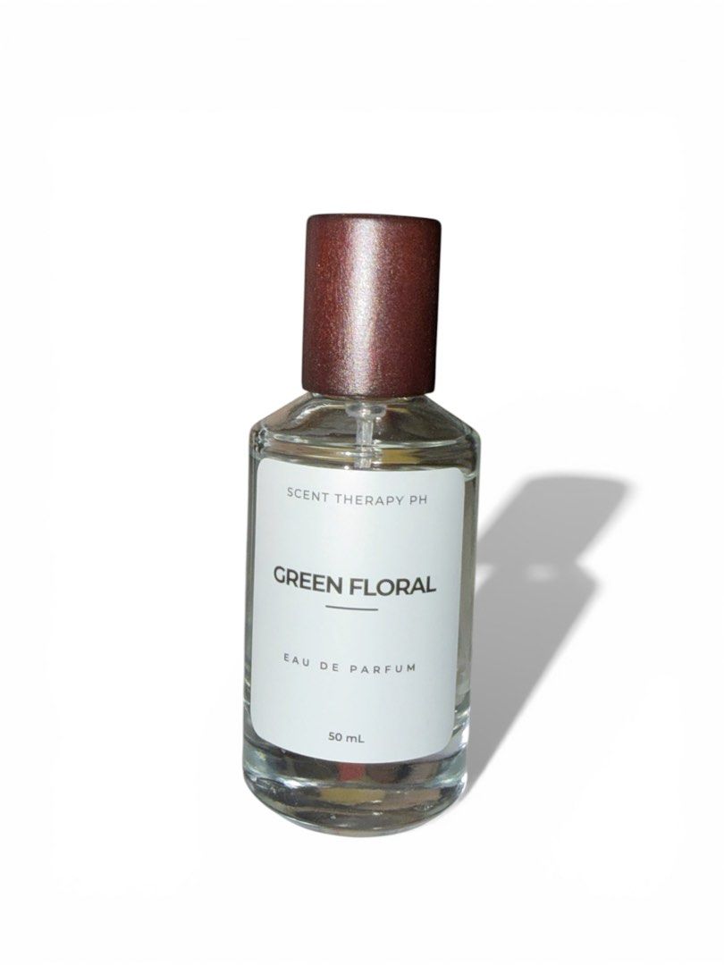 Scent Therapy PH Green Floral Eau de Parfum 50ml (Category: Fragrance & Deodorants) located in Santa Rosa. Submitted by ysabelle006 (Listing ID 1429969015, Image 1). Description: LOC: CAVITE / LAGUNA Scent Therapy PH Green Floral Eau de Parfum. The bottle contains 50ml of fragrance. The label indicates it is an Eau de Parfum. The bottle has a brown cap. The perfume is in a clear glass bottle..