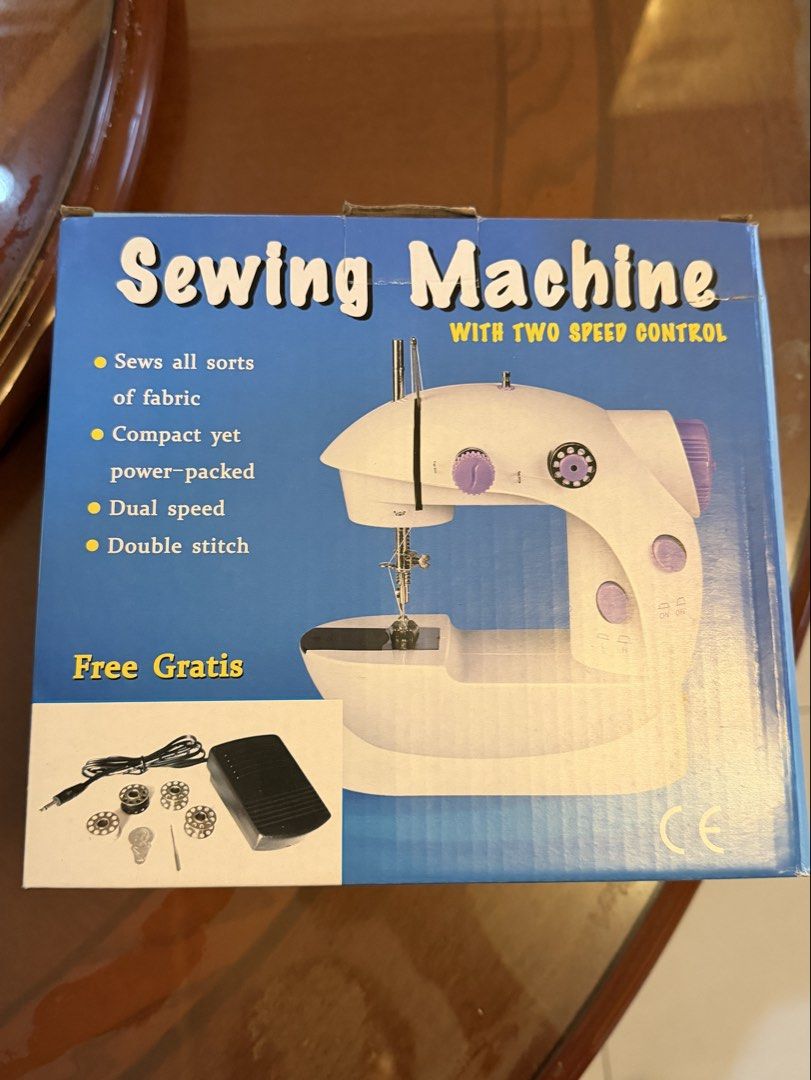 Sewing Machine with Two Speed Control (Category: Other Home Appliances) located in Paranaque City. Submitted by preloveditems111 (Listing ID 1429902152, Image 1). Description: Sewing machine sews all sorts of fabric. It is compact yet power-packed and features dual speed and double stitch. It comes with a foot pedal and other accessories. "Free Gratis" is included. The machine has a CE mark..