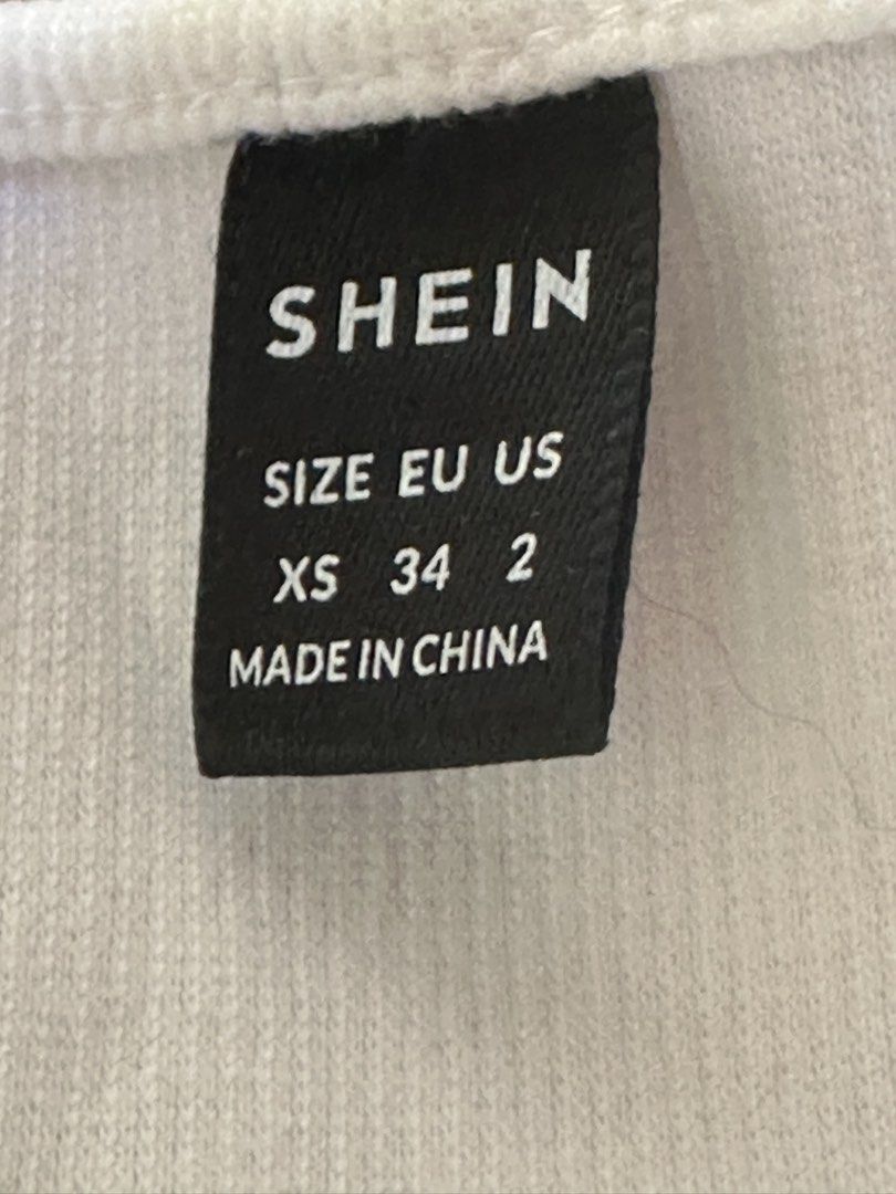 SHEIN White Crop Top XS (Category: Others Tops) located in Manila. Submitted by swirlsy (Listing ID 1429889418, Image 2). Description: little to no stains.
