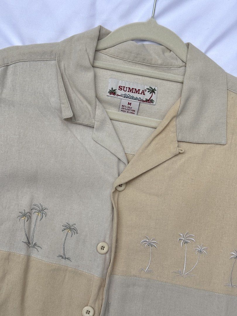 summer beach tropical palm tree embroidered button down shirt (Category: Tshirts & Polo Shirts ) located in Quezon City. Submitted by impulsivepeach (Listing ID 1429997531, Image 2). Description: MENS M ON TAG (can fit to XL for women) perfect as a beach cover up! exact measurements: width (armpit to armpit) - 22" length - 27.5" preloved in good condition PAY AS YOU ORDER loc: QC, mod: J&T/lalamove.