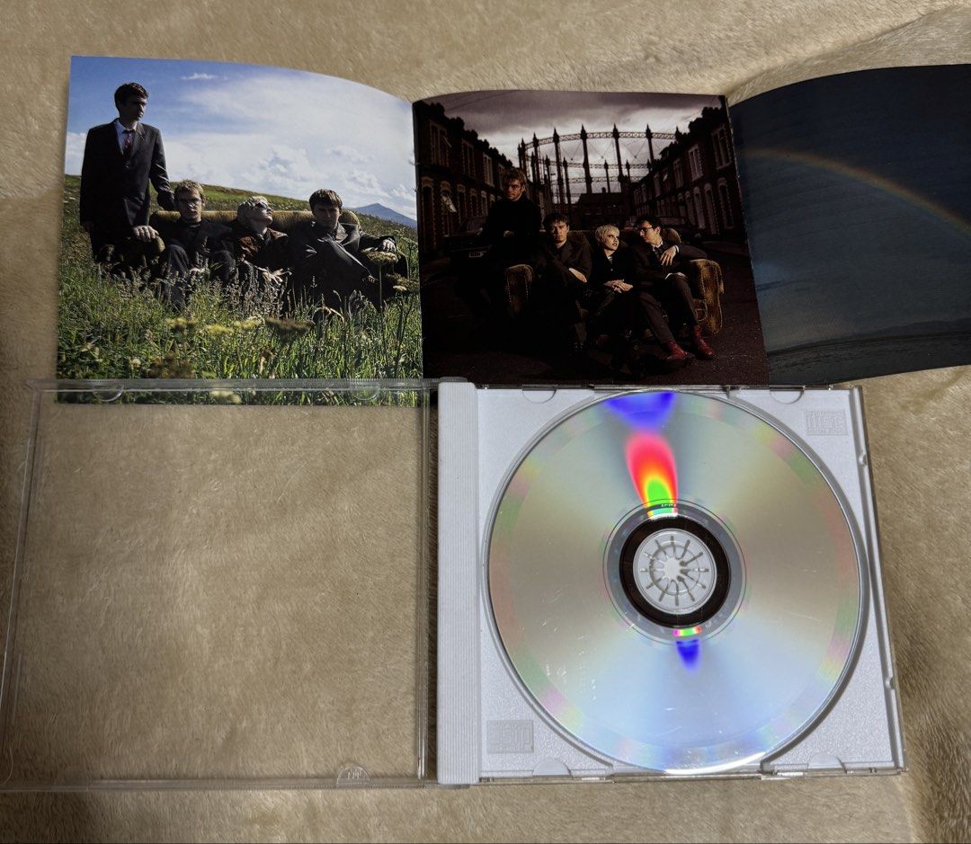 The Cranberries - No Need to Argue CD (Category: CDs & DVDs) located in Pasig City. Submitted by proteinboy6 (Listing ID 1429864670, Image 2). Description: Original CD of The Cranberries' album "No Need to Argue". Features the band on the cover and includes the CD and booklet with lyrics and photos. The CD case is intact. The album includes tracks like "Ode to My Family", "Zombie", and "Linger"..