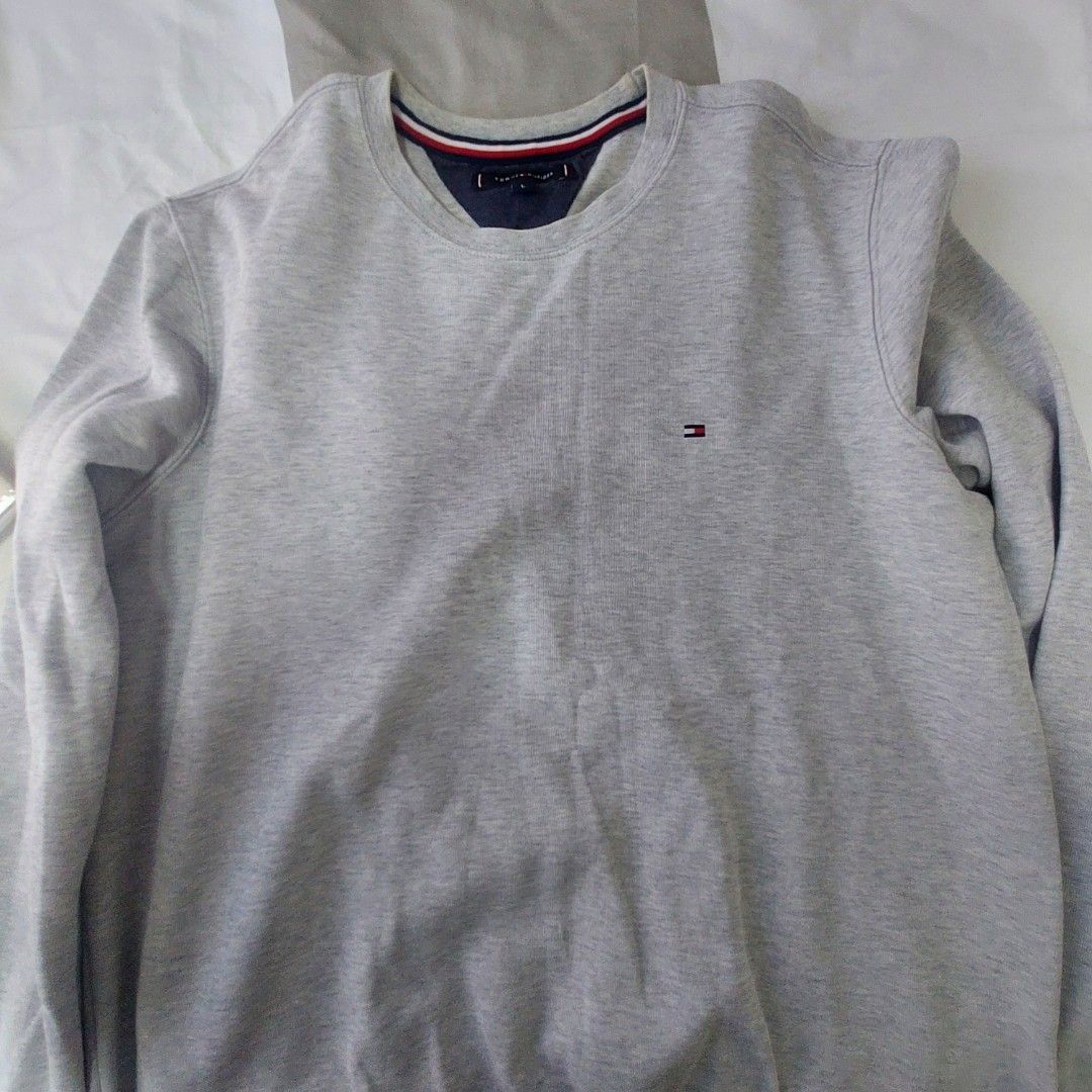 Tommy H. Pullover (Category: Tshirts & Polo Shirts ) located in Antipolo. Submitted by uncovidspace (Listing ID 1429896143, Image 1). Description: with slight torn (underarm) not visible.