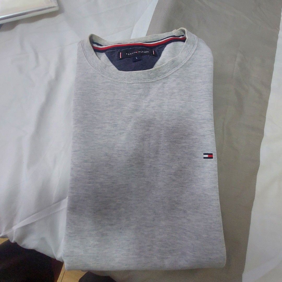Tommy H. Pullover (Category: Tshirts & Polo Shirts ) located in Antipolo. Submitted by uncovidspace (Listing ID 1429896143, Image 3). Description: with slight torn (underarm) not visible.