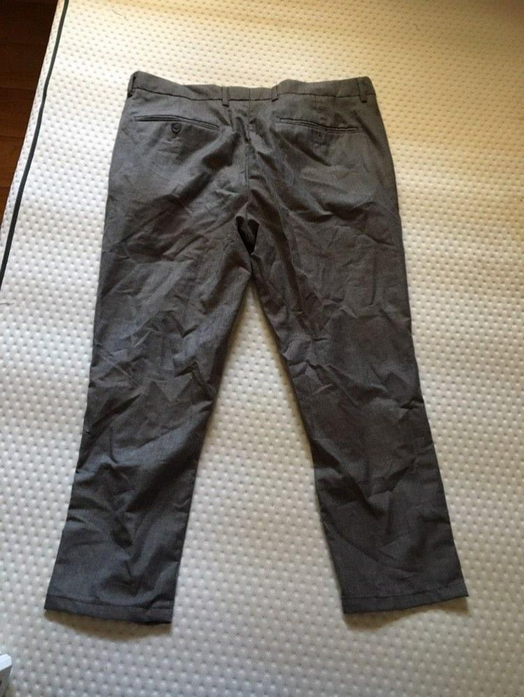 Topman Gray Mens Pants (Category: Jeans) located in Manila. Submitted by victtoria (Listing ID 1429886932, Image 3). Description: Stylish gray dress pants from Topman. Features a classic design with a button and zipper closure. The pants have a straight leg cut. The interior lining is white. Perfect for formal or smart casual occasions. Made from a durable fabric. Offers a comfortable fit..