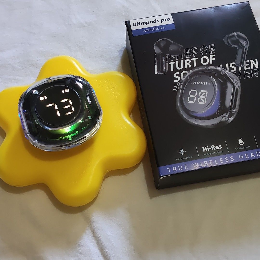 UltraPods Pro Wireless S3 Earphones (Category: Earphones) located in Paranaque City. Submitted by audioaddict0517 (Listing ID 1429868214, Image 2). Description: Experience true wireless freedom with these UltraPods Pro Wireless S3 earphones. They feature a digital display on the charging case. Available in multiple colors, including black, silver, and pink. The box indicates -Res audio and a 95 rating. Includes the charging case and the earphones