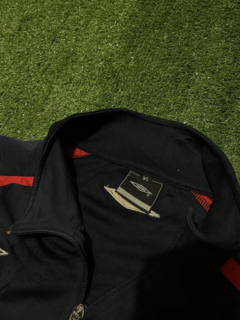 Umbro Track Jacket Navy Blue Red Accents (Category: Coats, Jackets and Outerwear) located in Sagbayan (Borja). Submitted by abejaronke97521 (Listing ID 1429882507, Image 3). Description: 28 length 21 width.