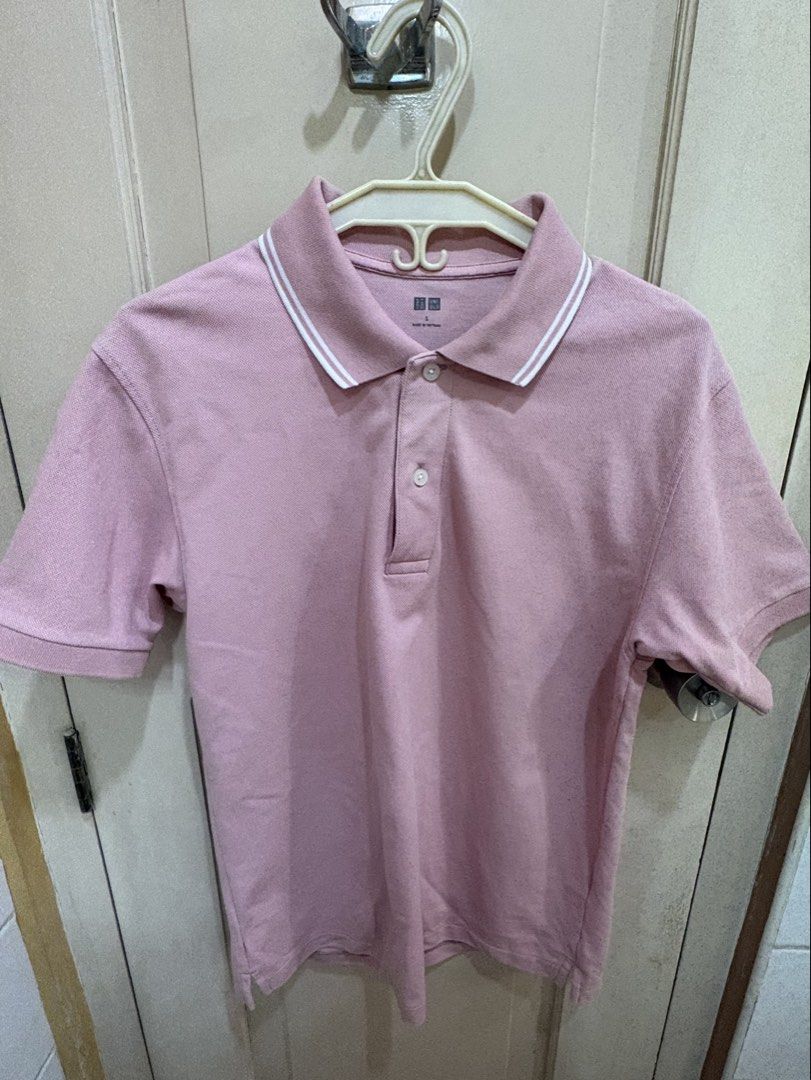UNIQLO Pink Polo (Size S) (Category: Tshirts & Polo Shirts ) located in Makati City. Submitted by jarled (Listing ID 1429931389, Image 1). Description: - Uniqlo polo shirt - Color: Pink - Size: S - Features a classic collar with white trim - Made in Vietnam - Short sleeves - Button-up placket - Perfect for everyday wear.