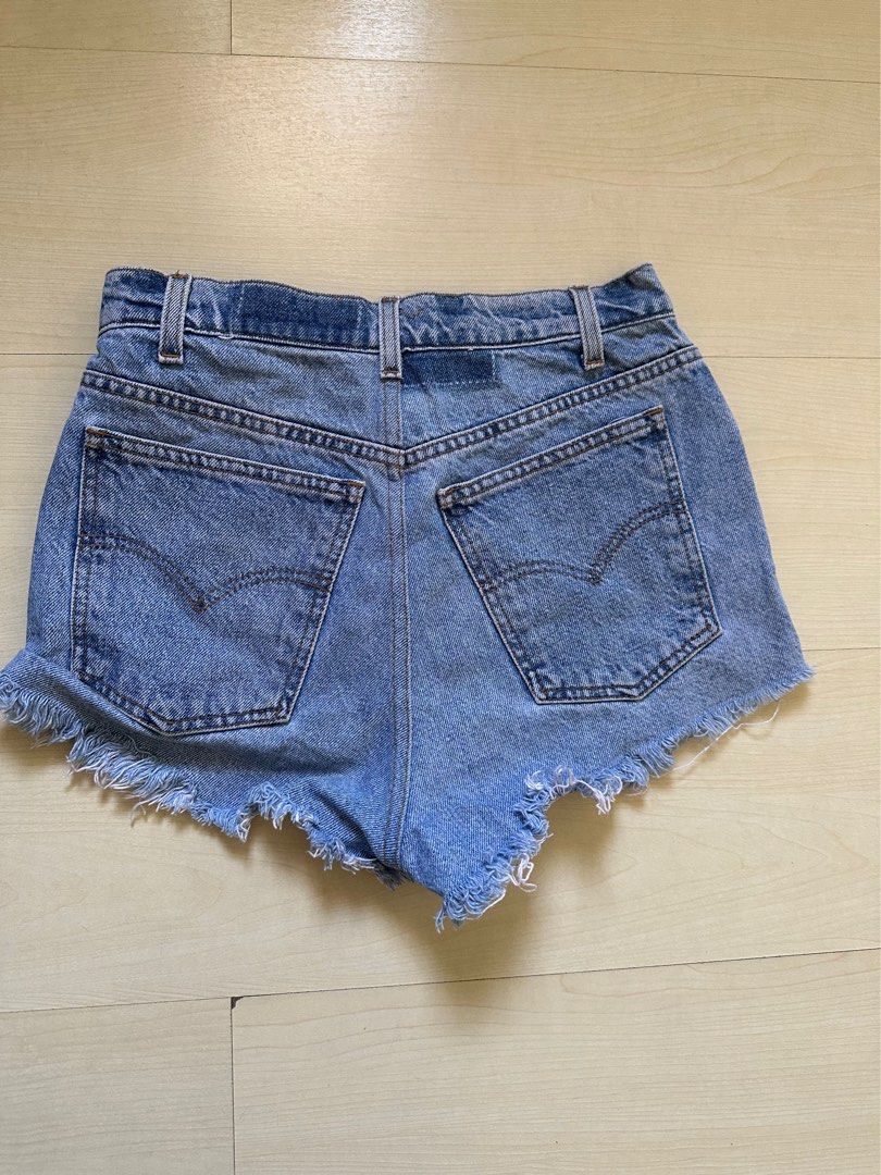 Vintage Levi's Denim Shorts (Category: Shorts) located in Pasig City. Submitted by 18029 (Listing ID 1429918716, Image 3). Description: - Vintage Levi's denim shorts - Light wash - Size S, fits 26-27 waist - Raw hem design.
