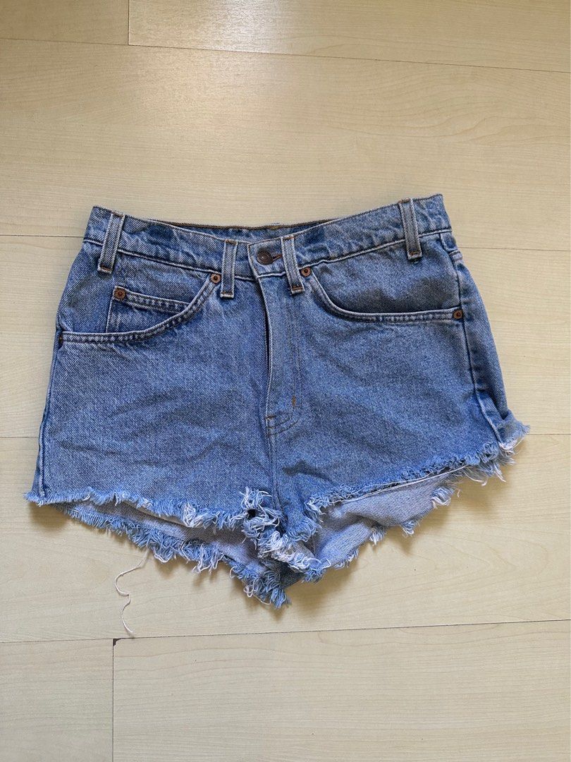Vintage Levi's Denim Shorts (Category: Shorts) located in Pasig City. Submitted by 18029 (Listing ID 1429918716, Image 2). Description: - Vintage Levi's denim shorts - Light wash - Size S, fits 26-27 waist - Raw hem design.