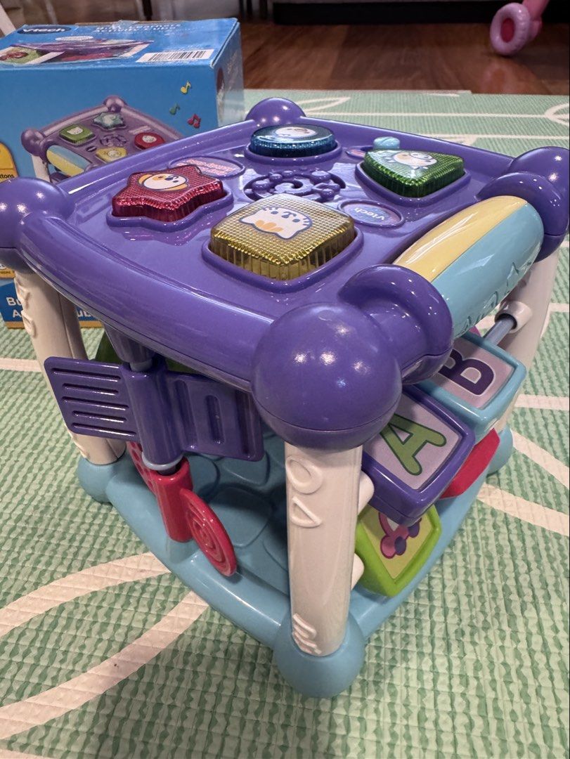 VTech Busy Learners Activity Cube (Category: Infant Playtime) located in Quezon City. Submitted by cm27sy (Listing ID 1429839639, Image 3). Description: - Exploration and fun is around every corner with the Busy Learner’s Activity Cube™ by VTech®. Featuring five sides to explore, this play cube attracts your baby’s attention and encourages imaginative play with music, light-up buttons, colors and more. Shape and animal buttons introduce animal na