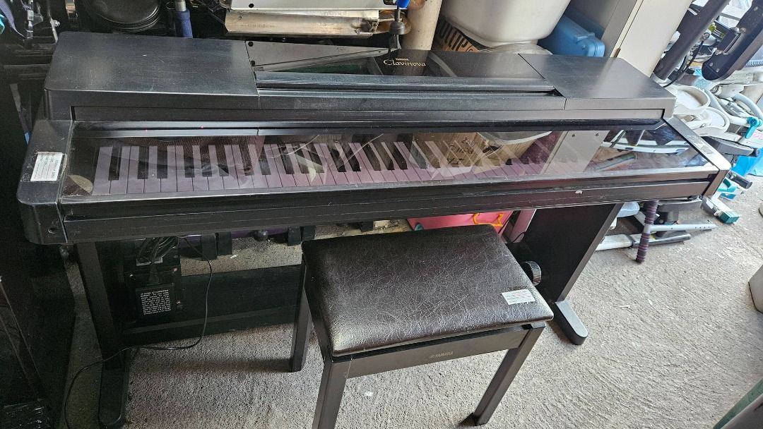 Yamaha Clavinova CLP-560 Digital Piano (Category: Musical Instruments) located in Sablan. Submitted by gongonshelley12 (Listing ID 1429946019, Image 2). Description: YAMAHA CLAVINOVA DIGITAL PIANO WITH ADJUSTABLE CUSHIONED BENCH ✔️JAPAN SURPLUS ✔️IN EXCELLENT CONDITION, FULLY FUNCTIONAL. ✔️DIFFERENT INSTRUMENT TONES TO SELECT: PIANO, ORGANS, STRINGS, HARPSICHORD, ETC. ✔️MAY KASAMA PO ITONG ELEGANT AT HEAVY DUTY NA HEIGHT-ADJUSTABLE BENCH (CHAIR) 