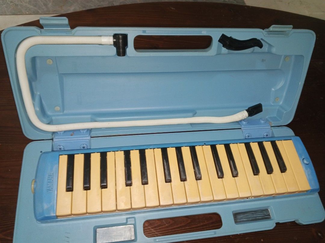 Yamaha Melodica with Case (Category: Musical Instruments) located in Caloocan City. Submitted by surplusandbnewshop (Listing ID 1429934459, Image 2). Description: Yamaha melodica comes with its original case and mouthpiece. The melodica is blue and has a handle for easy carrying. Perfect for beginners or experienced players..
