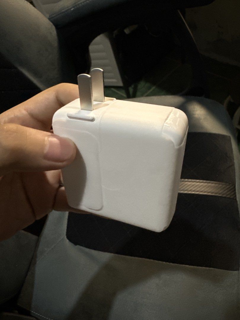70W USB-C Power Adapter (Category: Chargers & Cables) located in Mangaldan. Submitted by batrinabryan13 (Listing ID 1435297627, Image 1). Description: - Fresh from macbook pro m5 - Unused.