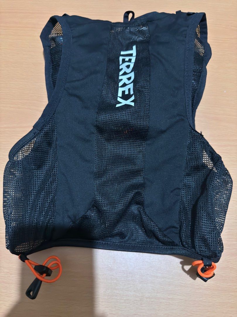 Adidas TERREX CLIMACOOL Trail Vest with 2 bottles (Category: Activewear) located in Mandaluyong City. Submitted by sm1212 (Listing ID 1435312051, Image 3). Description: Never been used, bought in Malaysia Size: Small Color: Black Main Material: 100% Polyester(100% Recycled), Mesh Comes with 2 collapsable bottles (still sealed with plastic) RFS: Too small for me. .