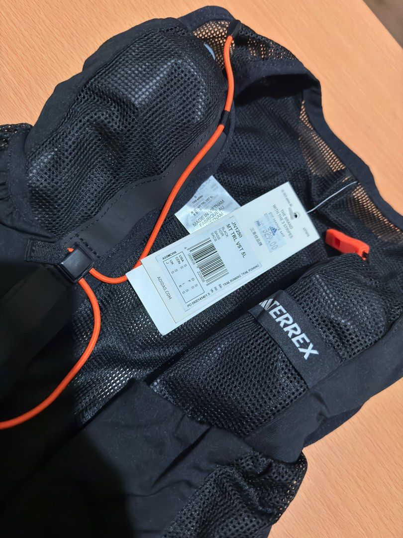 Adidas TERREX CLIMACOOL Trail Vest with 2 bottles (Category: Activewear) located in Mandaluyong City. Submitted by sm1212 (Listing ID 1435312051, Image 2). Description: Never been used, bought in Malaysia Size: Small Color: Black Main Material: 100% Polyester(100% Recycled), Mesh Comes with 2 collapsable bottles (still sealed with plastic) RFS: Too small for me. .