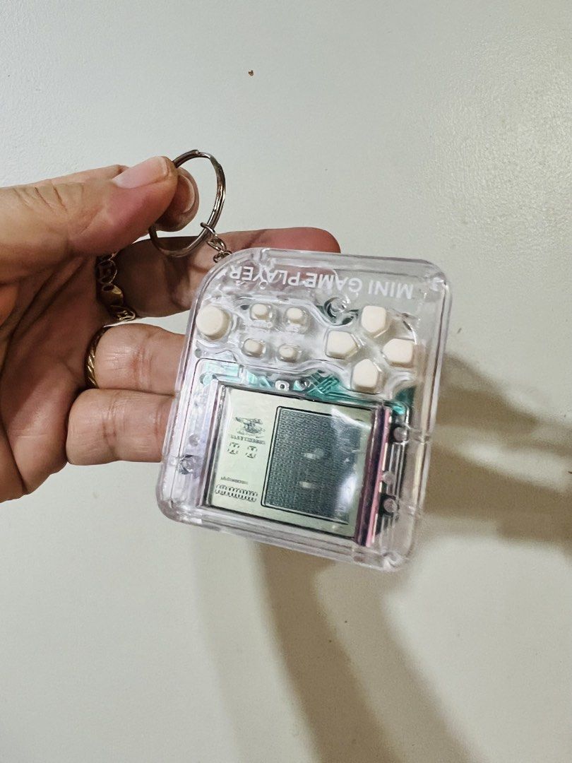Affordable Mini Brick Game Console Keychain 😍👌 (Category: Controllers) located in Malolos. Submitted by afford.japan (Listing ID 1435171758, Image 1). Description: Affordable Mini Brick Game Console Keychain 😍👌.