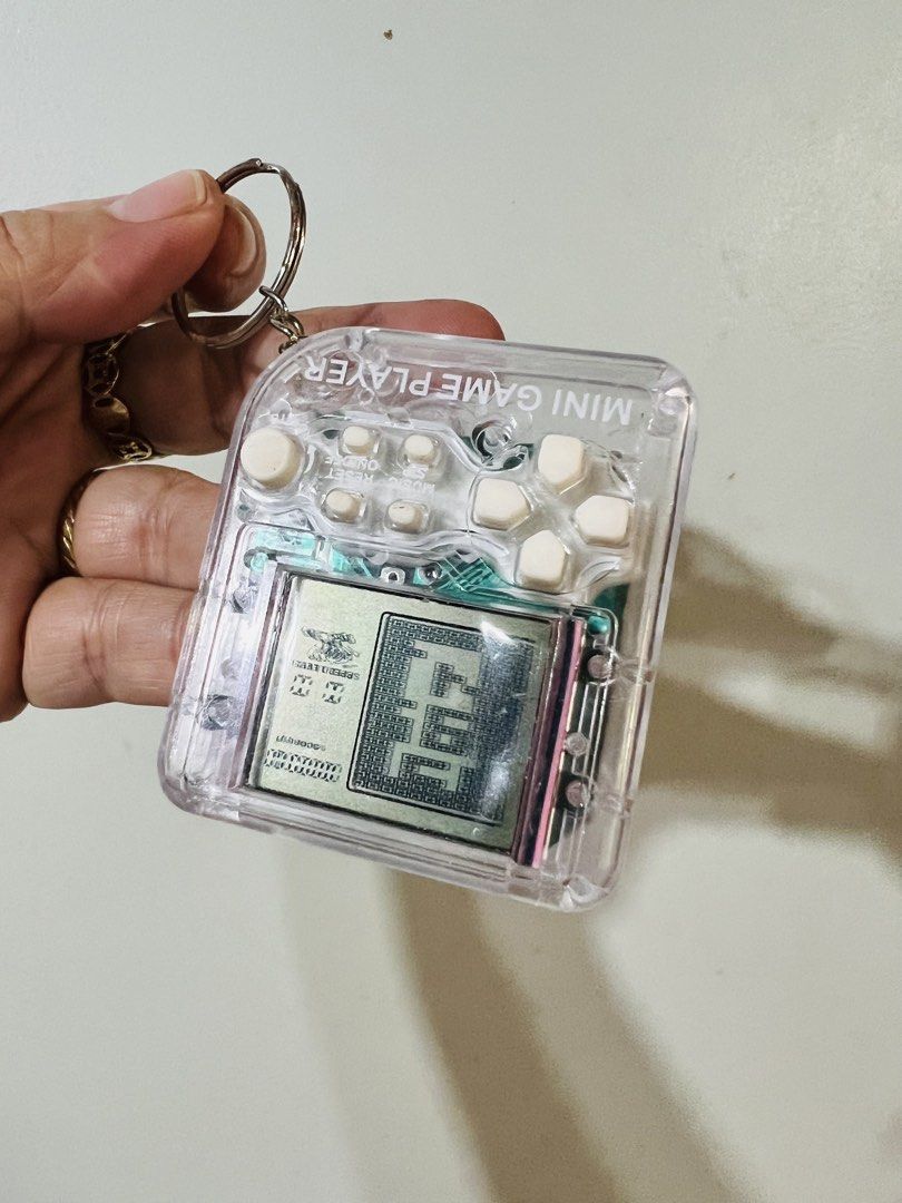 Affordable Mini Brick Game Console Keychain 😍👌 (Category: Controllers) located in Malolos. Submitted by afford.japan (Listing ID 1435171758, Image 3). Description: Affordable Mini Brick Game Console Keychain 😍👌.