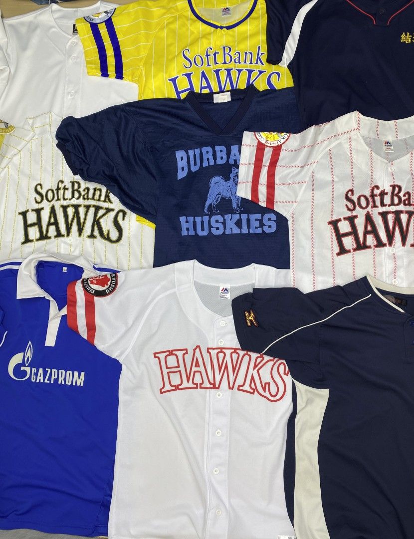 Assorted Baseball Jerseys (Category: Tshirts & Polo Shirts ) located in Navotas City. Submitted by jericafits (Listing ID 1435270314, Image 2). Description: Collection of baseball jerseys featuring various designs and team names. Includes jerseys with "SoftBank HAWKS", "Burbank Huskies", "Hase", and "Kyowa" logos. Different colors and styles are available, with some featuring stripes and numbers. Perfect for baseball enthusiasts or collectors..