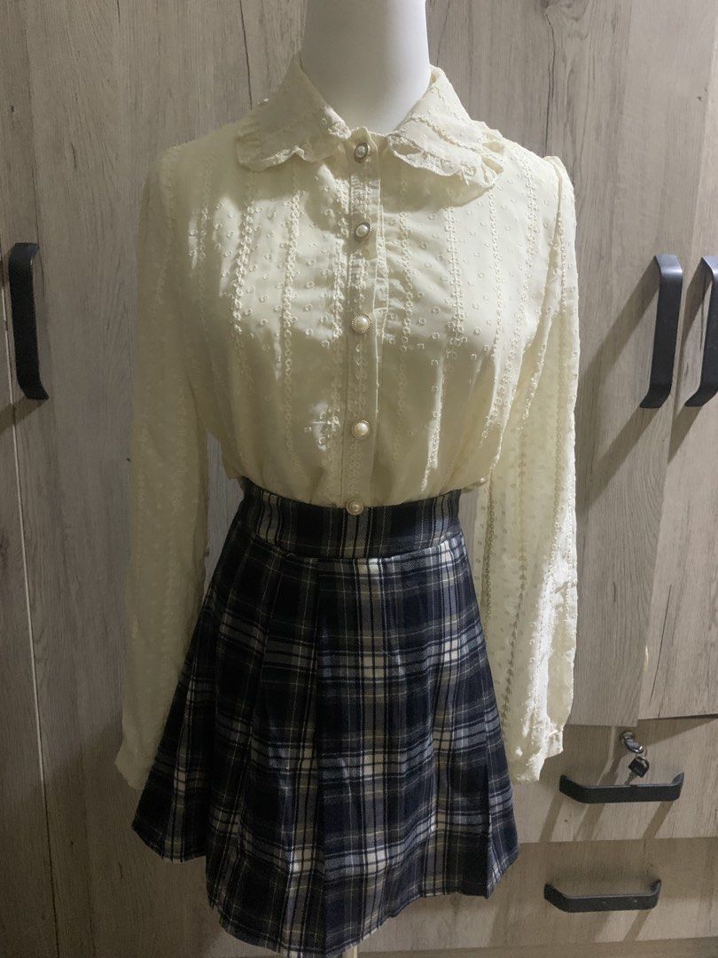 Beige blouse (Category: Blouses) located in Cavite. Submitted by archimage (Listing ID 1435272625, Image 1). Description: - Beige blouse - Size S - Features pearl buttons - Delicate design - no flaws - used once as an inner top for my lolita outfit.
