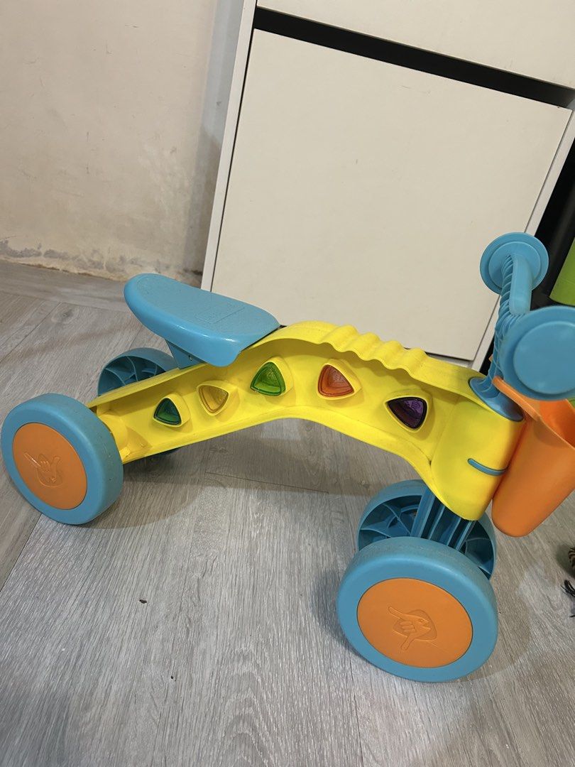 Chillafish Itsibitsi 4-Wheel Ride-on (Category: Infant Playtime) located in Cavite. Submitted by proud.ausome.mama (Listing ID 1435331272, Image 3). Description: Bought this in Toy Kingdom. Not something my ausome kid wants. Trampoline pa din 😄 For Sale! Used but not abused. Send me your offer! - Chillafish Itsibitsi ride-on toy. - Bright yellow frame with blue wheels and seat. - Includes a small orange basket. - Designed with four wheels for en