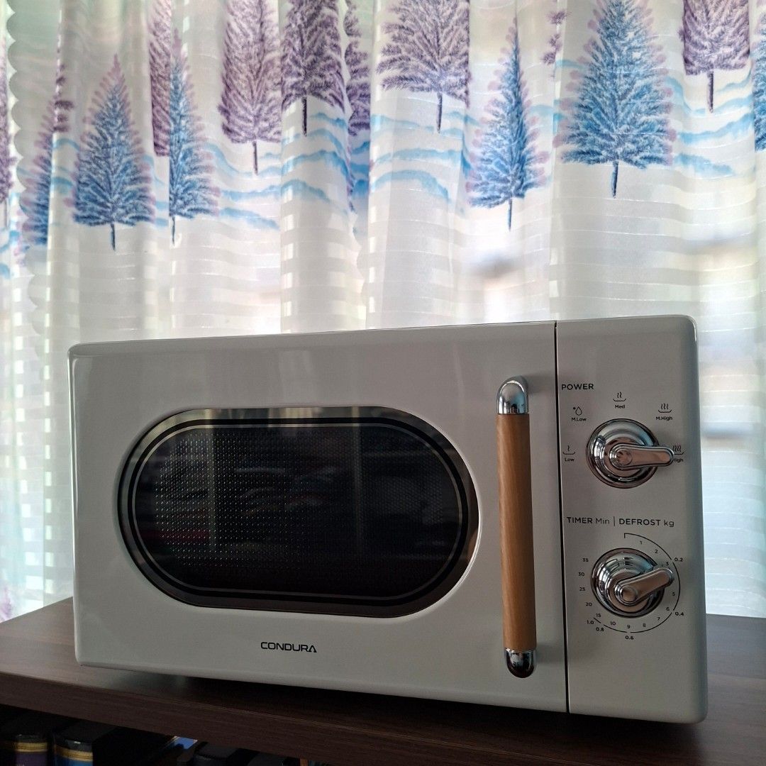 Condure retro vintage design microwave oven (Category: Cookers) located in Pasig City. Submitted by last_price_posted (Listing ID 1435273073, Image 2). Description: This is available as long as this is posted/visible listing. You may message me with the answer to the following questions once you are fully decided to purchase, should you need further thinking and canvassing you may just save the listing for future reference. 1. Will you be persona