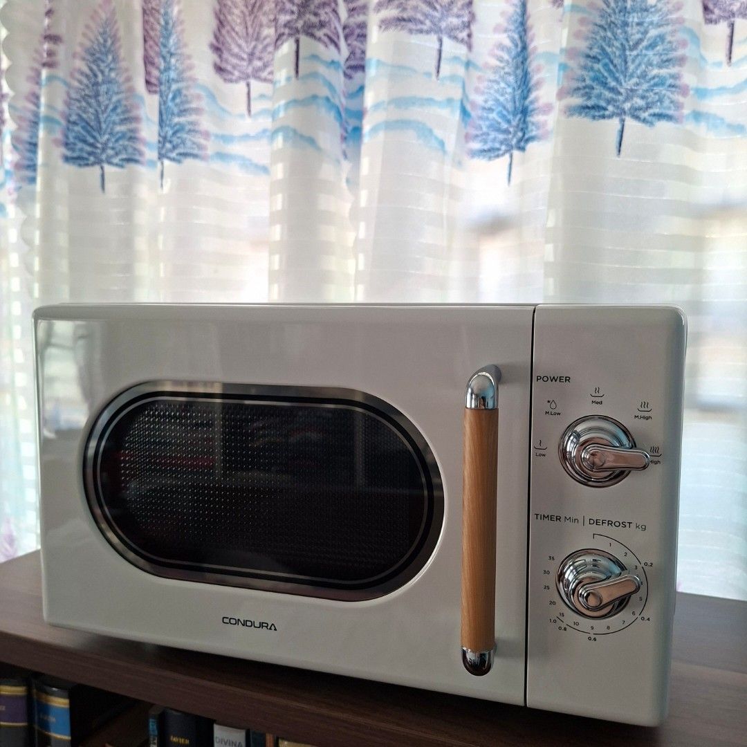 Condure retro vintage design microwave oven (Category: Cookers) located in Pasig City. Submitted by last_price_posted (Listing ID 1435273073, Image 3). Description: This is available as long as this is posted/visible listing. You may message me with the answer to the following questions once you are fully decided to purchase, should you need further thinking and canvassing you may just save the listing for future reference. 1. Will you be persona
